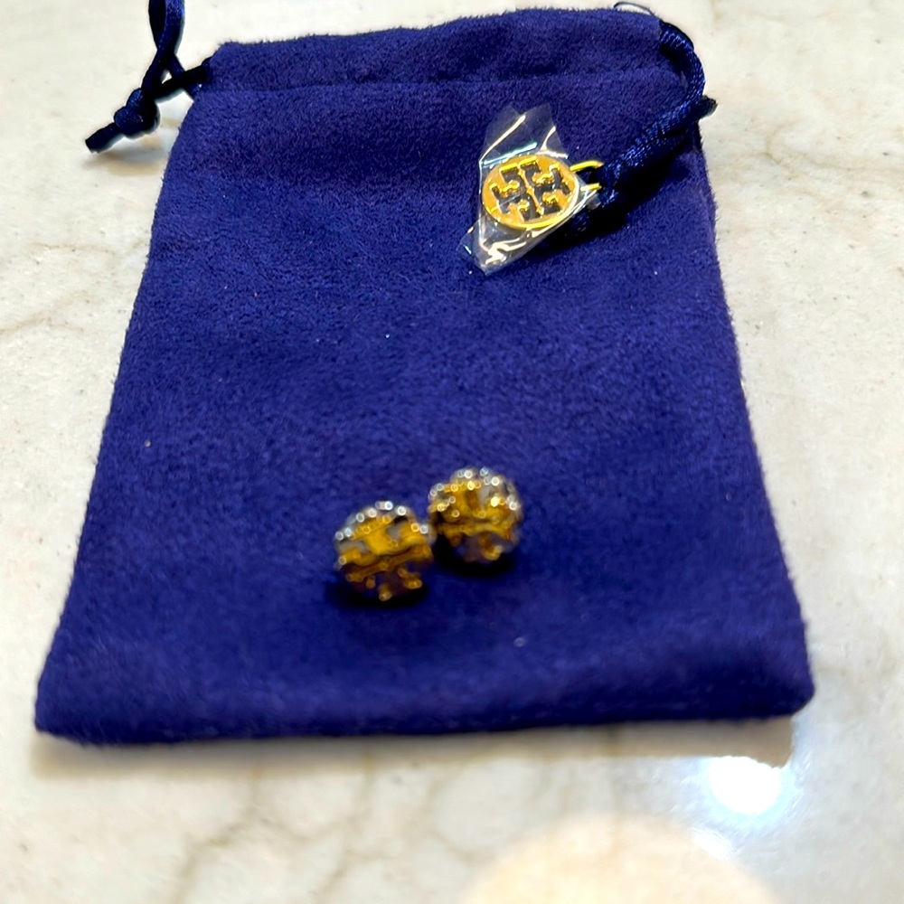 Tory Burch Classic Logo Stud earrings in Silver and Gold.